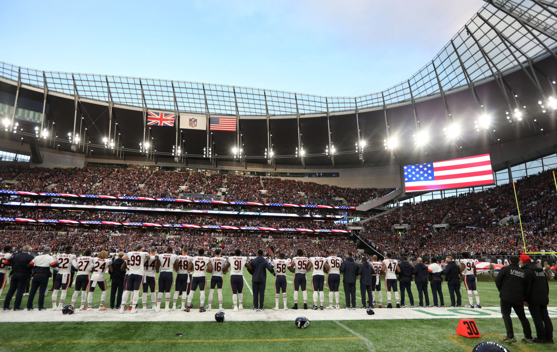 The Chicago Bears stand for the National Anthem before a game against the Oakland Raiders Sunday, Oct. 6, 2019 at Tottenham Hotspur Stadium in London, UK.